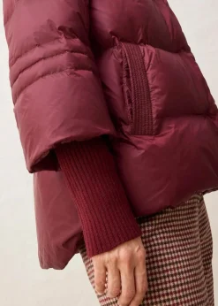 Daunenjacke mit recycelten Daunen​ und Strickärmeln